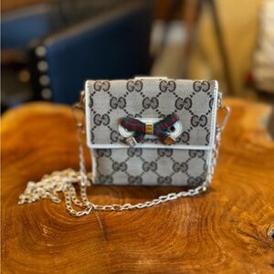 Gucci
GG Princy French Flap Wallet converted Crossbody